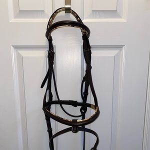 Brand new bridle with reins. No tags
